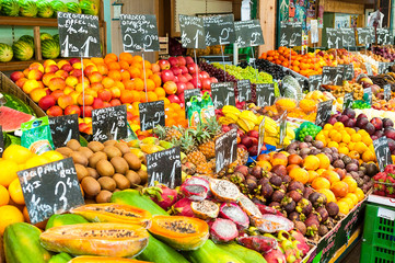 Vegetables and fruit at a farmers market stall. 