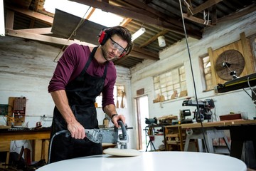 Carpenter working on his craft