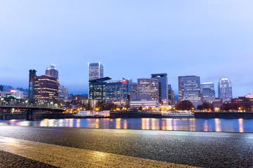 empty asphalt road with cityscape and skyline of portland