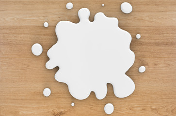 milk splatter on wooden background