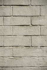Old gray painted brick wall.