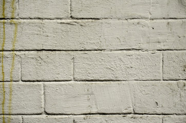 Old gray painted brick wall.