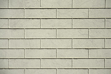 Old gray painted brick wall.