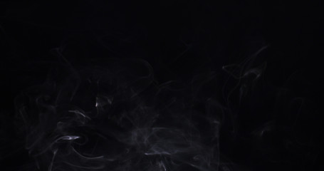 Obraz premium backlit smoke background over black, 4k photo
