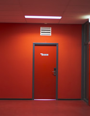 red door in the hallway