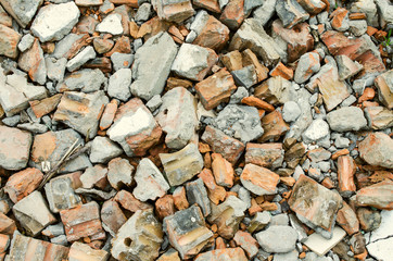 Background of construction waste stone bricks.