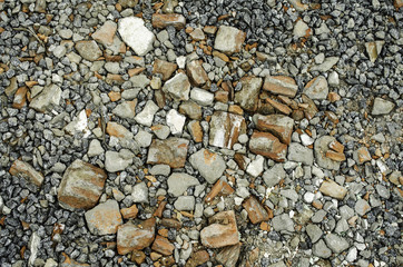 Background of construction waste stone bricks.