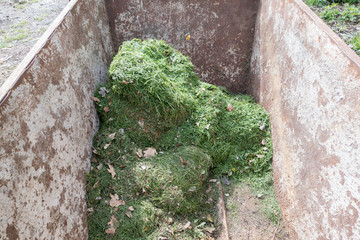 rusty steel containers for garden waste