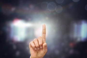 Composite image of finger pointing