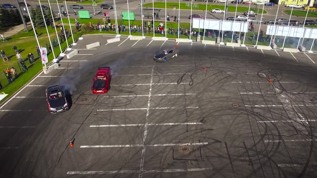 Aerial view of drifting cars