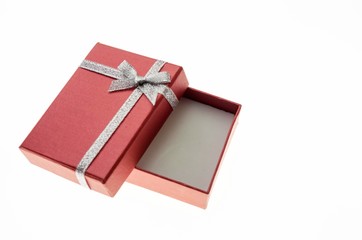 empty red gift box with a silver ribbon
