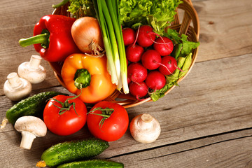Vegetables . Fresh Bio Vegetable in a Basket. Over Nature Background