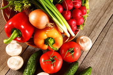 Vegetables . Fresh Bio Vegetable in a Basket. Over Nature Background