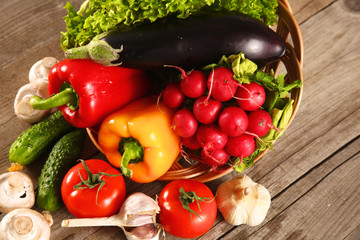 Vegetables . Fresh Bio Vegetable in a Basket. Over Nature Background