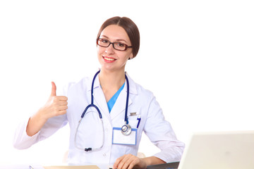 Fototapeta premium Happy smiling young beautiful female doctor showing blank area for sign or copyspace, isolated over white background