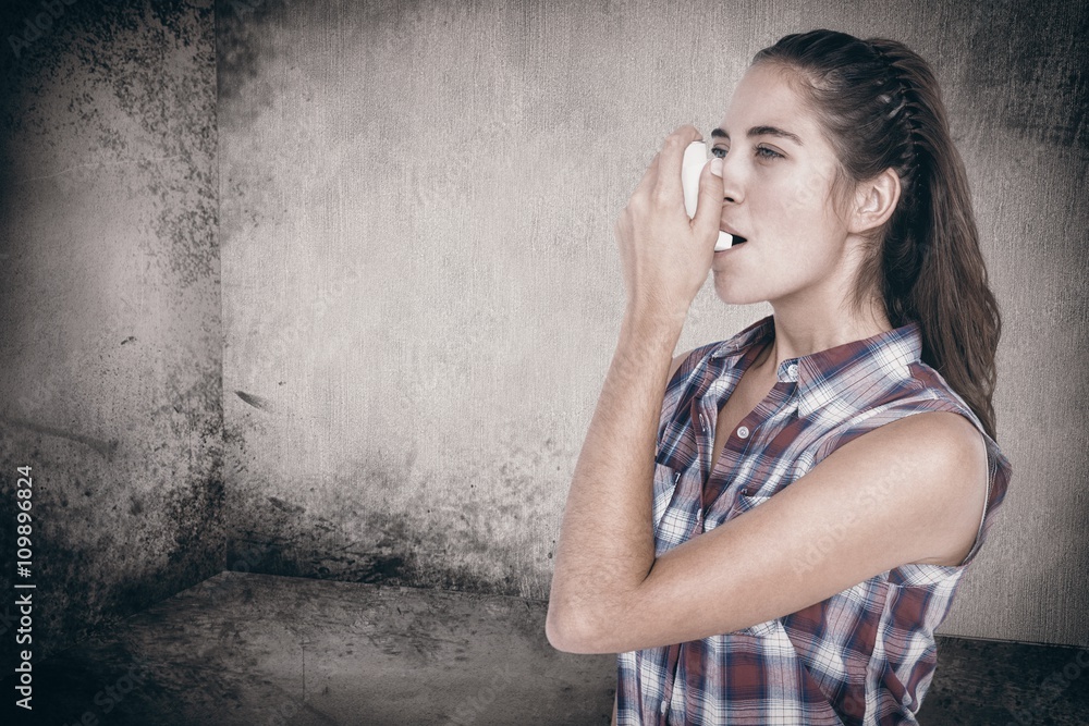 Poster composite image of woman having asthma using the asthma inhaler