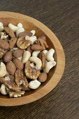 wooden bowl with mixed nuts