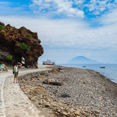 Alicudi island shore with Filicudi on the background, Sicily. - 109899265