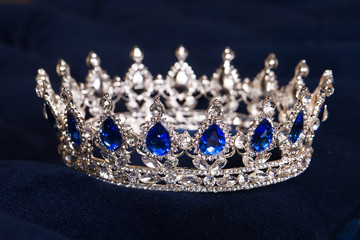 Royal crown with sapphires, luxury retro style.