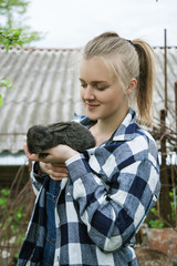 beautiful young women with rabbit