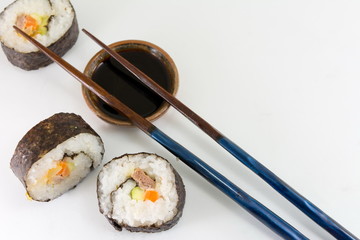 Sushi rolls and chopsticks