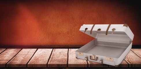 Composite image of open suitcase