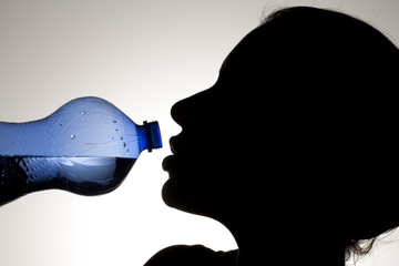 thirsty female drinking water.
