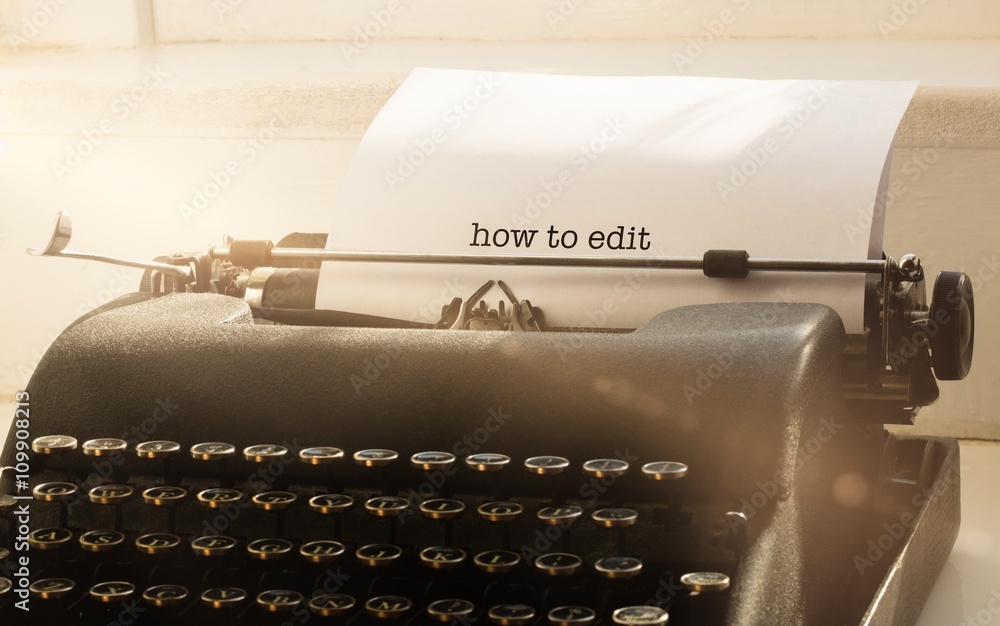 Aufkleber how to edit against typewriter on a table