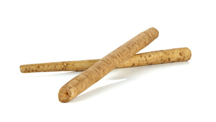 Fresh Burdock roots on white background