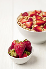 strawberries bowl and breakfast cereal