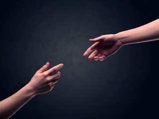 Hand about to touch another one