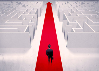 Smart businessman avoiding maze concept