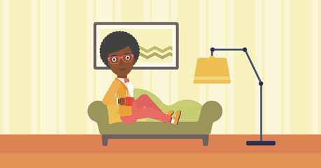 Fototapeta premium Woman lying with cup of tea.