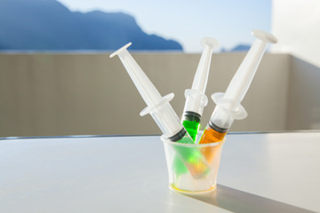 Syringe with syrup medicine use to feed for kids.