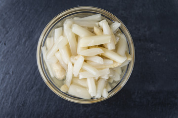 Preserved white Asparagus on a slate slab