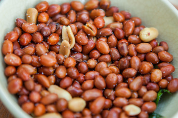 Deep fried peanuts in bowl.