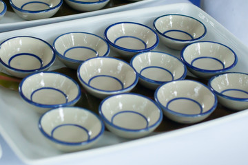 Small ceramic bowl of canape.