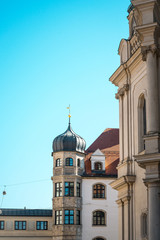 Fototapeta na wymiar Traditional street view of old buildings in Munich, Bavaria, Ger
