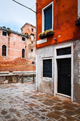 Fototapeta premium Traditional street view of old buildings in Venice, ITALY