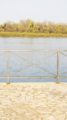 Metal railing on waterfront