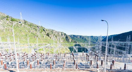 transformer substation against a blue sky ,electricity background