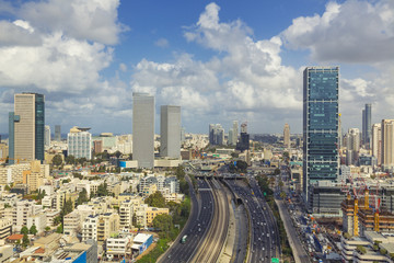 Fototapeta na wymiar Tel Aviv City Skyline And Ayalon Freeway At Cloudy Day