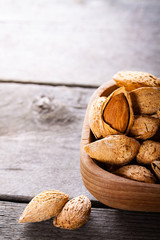 Almonds in a wooden bowl. 