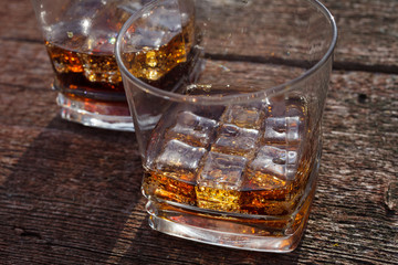 Two glasses of cola with ice