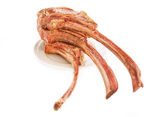 Bone-in Raw seasoned rib eye steak