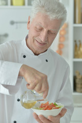 elderly male chef
