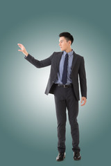 Holding pose of Asian business man