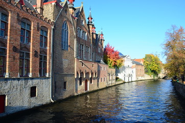 Typical sightseeing scenery with water canal in Bruges, "Venice of the North", cityscape of Flanders, Belgium