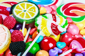 Fototapeta na wymiar multicolored lollipops, candy and chewing gum