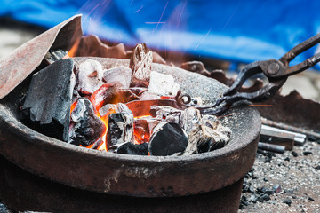 forge a burning forge and tools